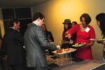 Gala attendees going through buffet line.